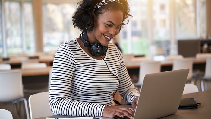 student on Laptop